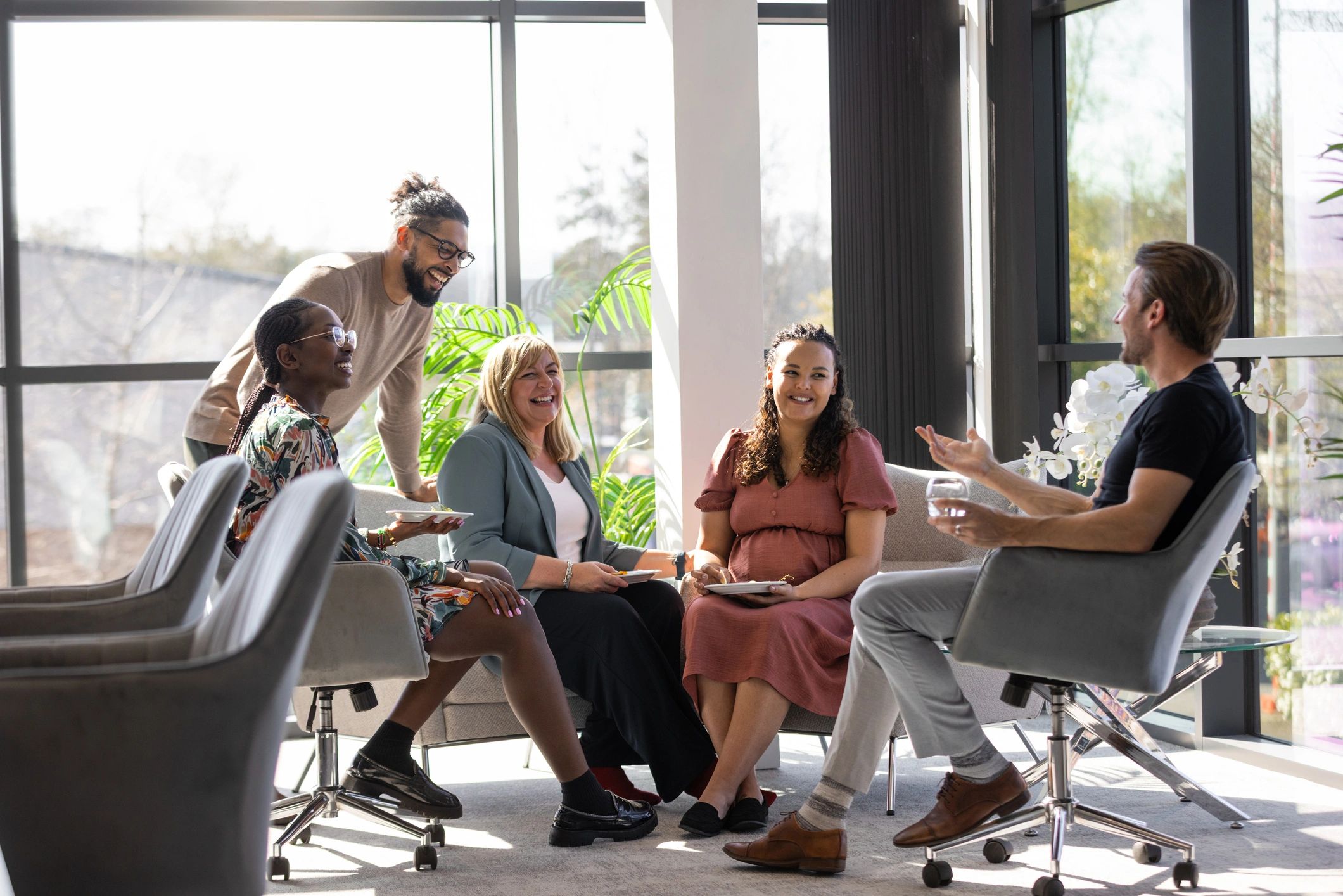 Business Team Sharing a Laugh During Work